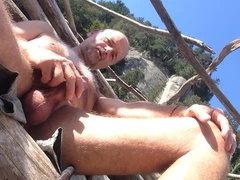 nude cub pulling on his foreskin till swelling in public