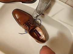 Piss in men's dress shoe