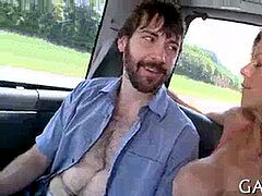 insane one-eyed monster riding inside a car