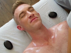 Lad with bleached hair gives a massage to a pervert