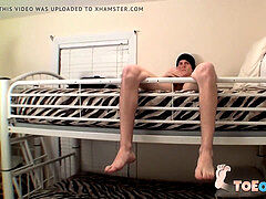 Homo rubs his hairy soles and trouser snake on the bunk couch solo