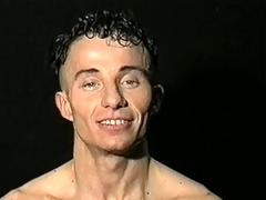 Muscled stud stripteases before jerking his rod