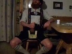 Man in lederhosen teases his achy prick