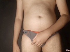 Throbbing hunk shoots massive load on camera while moaning