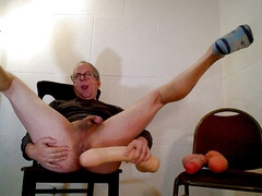 Playing with a monster dildo