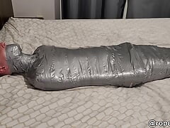 making sure the mummified boy won't go anywhere