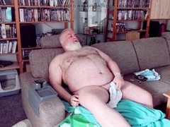 Bear guy gets off after playing sports