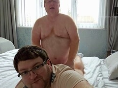 Daddy takes his fellow for a ride on the bed