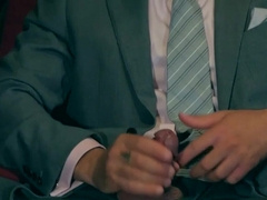 Men in suits share intimate blowjob in flawless manners