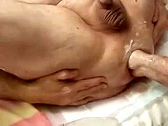 On my back... broad open and fisted stiff