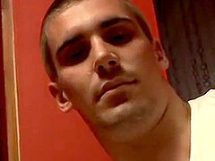 Thug jock Evan Heinze massaging socks in foot fetish solo