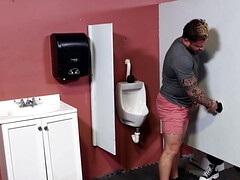 Riley Mitchel goes to the gloryhole to play with a big cock