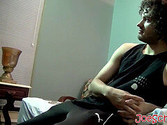 stunning man with curly dark-hued hair jerking off his big cock