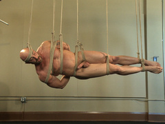 Muscular males play rough maledom games at the gym