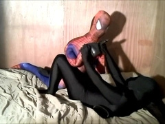 Gasmasked frogman unwraps his black latex to overpower spiderman