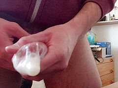 meaty popshot inwards a condom after 10 day of abstinence