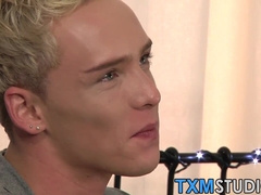 Fabulous young gay Kris Blent wanking during photoshoot