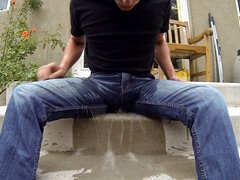 Pissing in a condom until it bursts in my jeans