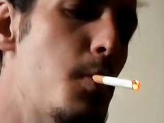Smoking musician breaks for a quick yank