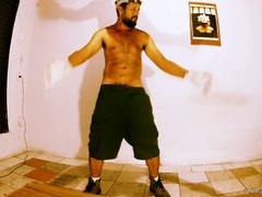 Furry naked man with hairy gay beard dances seductively