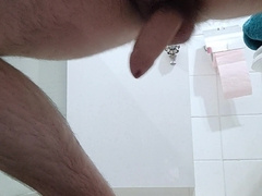 Unshaved boy drains before douche