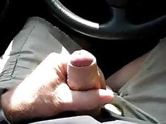 Dad strokes uncut cock in car
