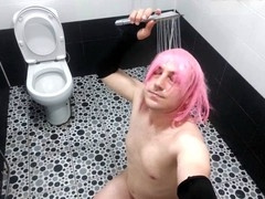 Curvy crossdresser Ketty teases on the bathroom floor