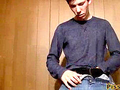 young fellow pees and pours it on himself before masturbating