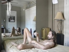 Hippy strips and oils his body before jacking off
