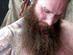 Hairy and tattooed hunk masturbating