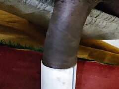 Indian boy at home having fun with conduit pipe and cumming inside it