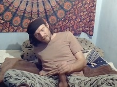 Teasing in open crotch pants on camera