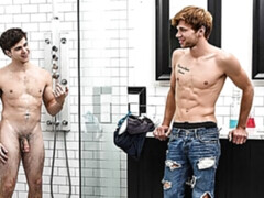 Will Braun jerks next to Dalton Briggs in the bathroom