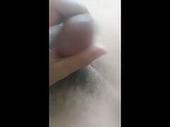 sexy, young Thai guy shows his raw circumcised red head cock and ejaculates white liquid using his hot saliva love lube