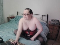 Curvy wife with large breasts and shaved pussy in sexy red lingerie teases on cam