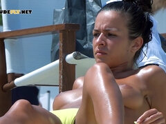 Adorable nudist teen enjoy sunbathing at the beach