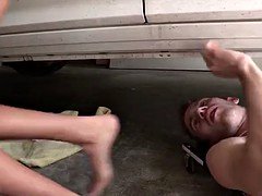 Daring sister sucks her older brother's dick in the garage