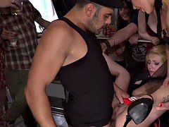 Blonde slave gets double penetration in public