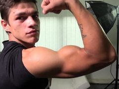 Handsome Athletic boy shows off his abs