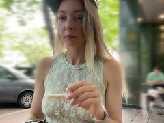 Anastasia Ocean gets off with daring public masturbation in a bustling café, wearing a see-through top and no panties