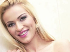 A blonde pees in the shower and then she receives a dick