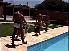Poolside cock sucking and ass fucking session of gay orgy