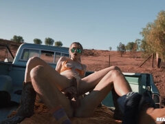 Lewd tiny babe Lilly Bell sucks mammoth penis outdoor