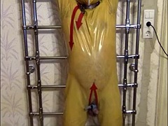 Rubberslave, Grid, shackles and CBT
