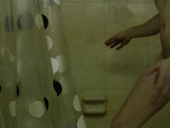 Busty shower teen teases the camera