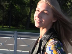 Pretty thing with blue eyes is sucking a really large cock