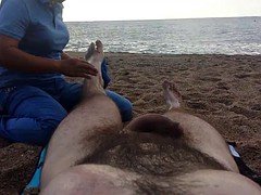 Nude massage on the beach