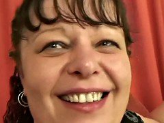 Plump mommy takes two young cocks