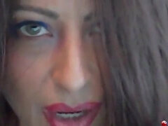 Glorious dark haired is smoking in front of the camera, just because it turns her on