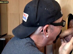 Real gloryhole DILF jerks BFs cock at home